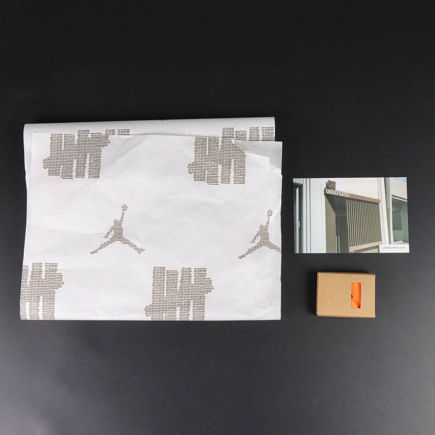 Air Jordan 4 x Undefeated [2025]